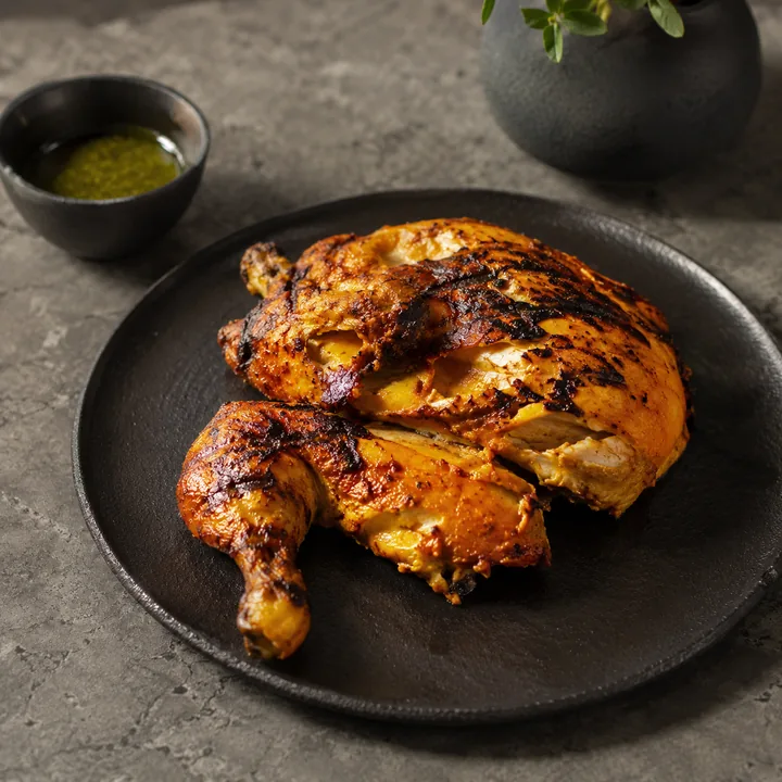 Pollo entero al carbón